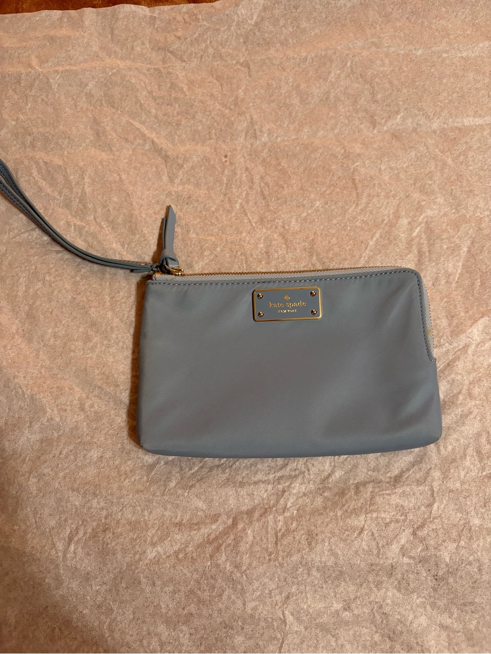kate spade gray leather wristlet clutch with gold-tone plaque